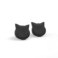 Handmade black cat-shaped earrings on a white background.